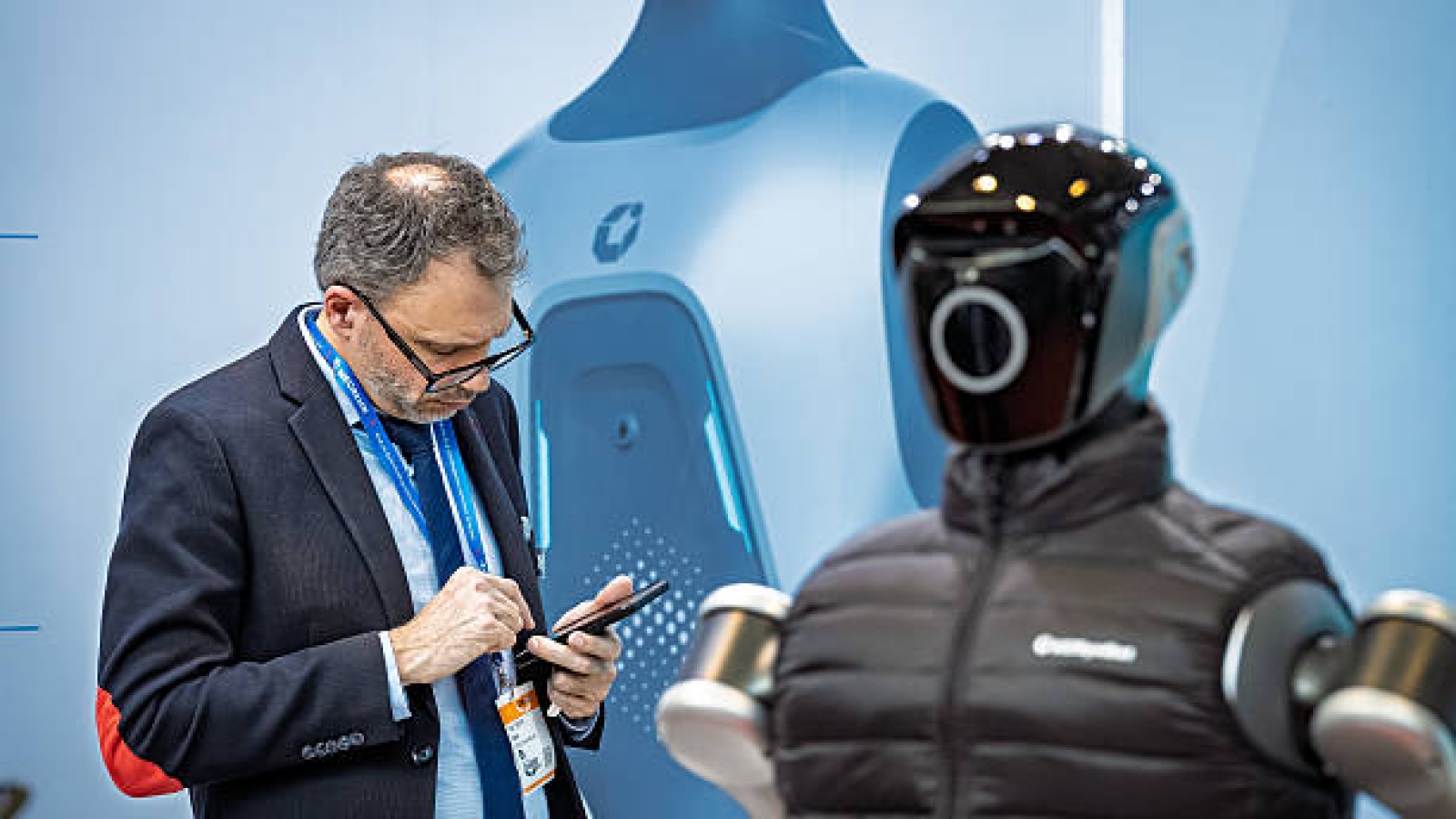 A visitor interacts with an automation solution at LogiMAT 2026 in Stuttgart, Germany, on March 24, 2026. (Photo by Leonardo Gerzon/NurPhoto via Getty Images)